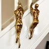 Darthome Limited Set Of 2 Gold Climbing Men Figurines